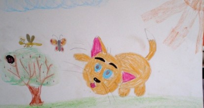 Веселый котенок